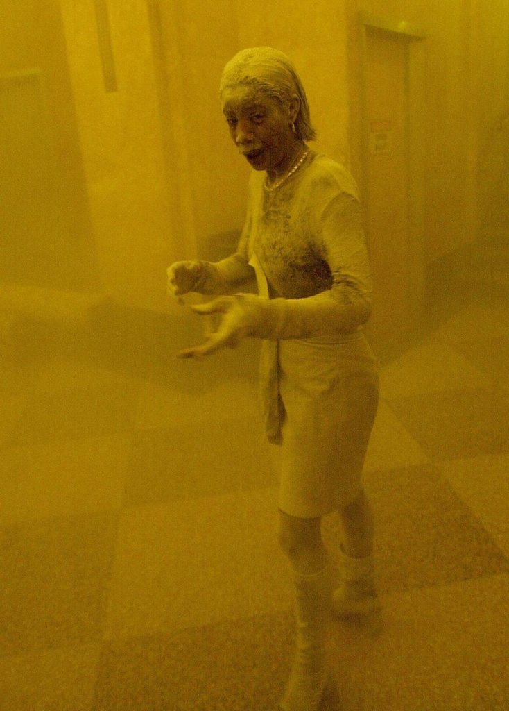 Marcy Borders, covered in dust, took refuge in an office building.