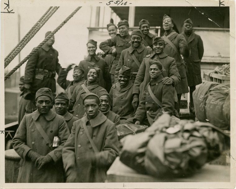 Old days in Harlem: 369th National Guard Regiment, also known as the Harlem Hellfighters, a well-known New York based black regiment during World War I, returning home